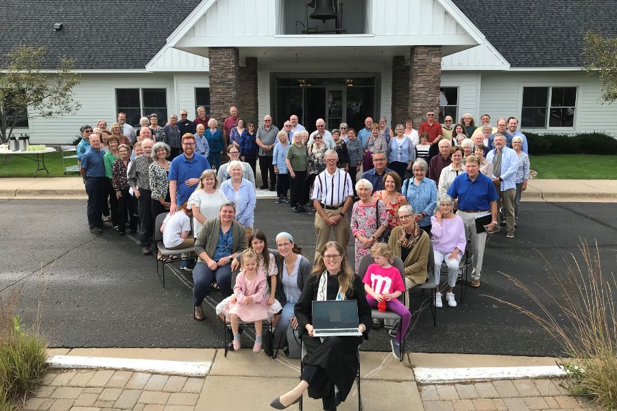 All Church photo with people gathering in heart shape